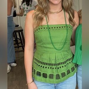 Green eyelet cutout peplum top